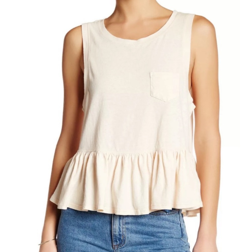 Free People relaxed distressed peplum top 🌸